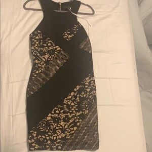 Black and Nude dress size medium, never worn.